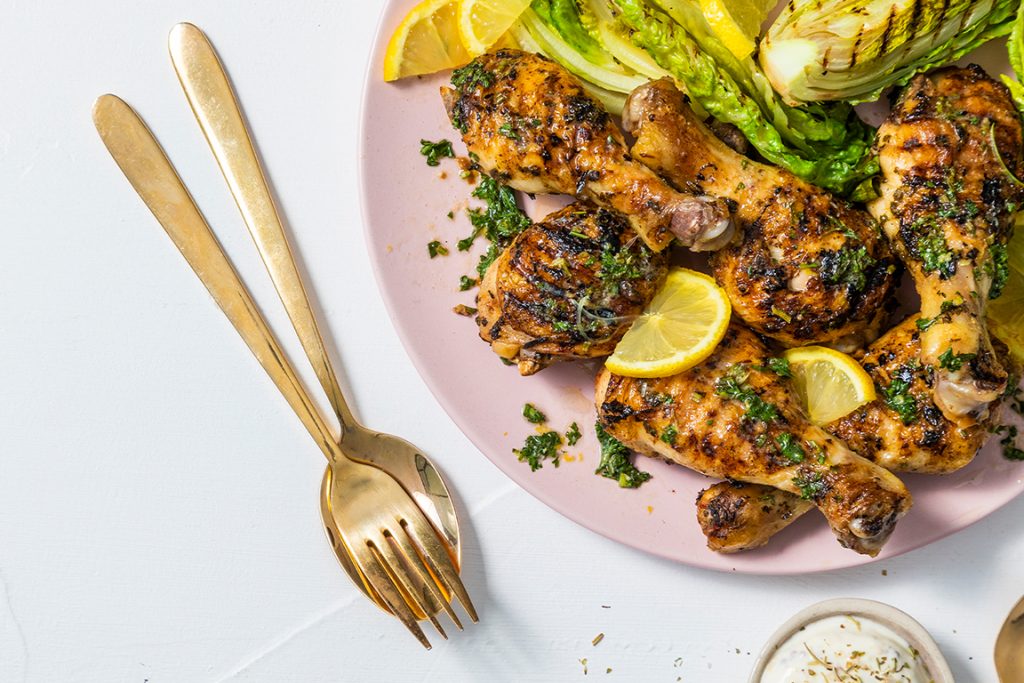 Herby drumsticks with cos wedges and lemon yoghurt Astral Chicken