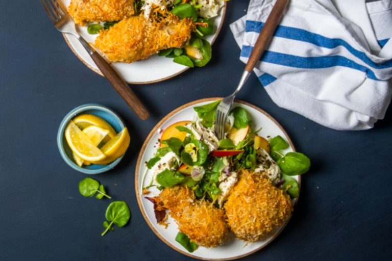 Parmesancrusted chicken pieces with nectarine and burrata salad